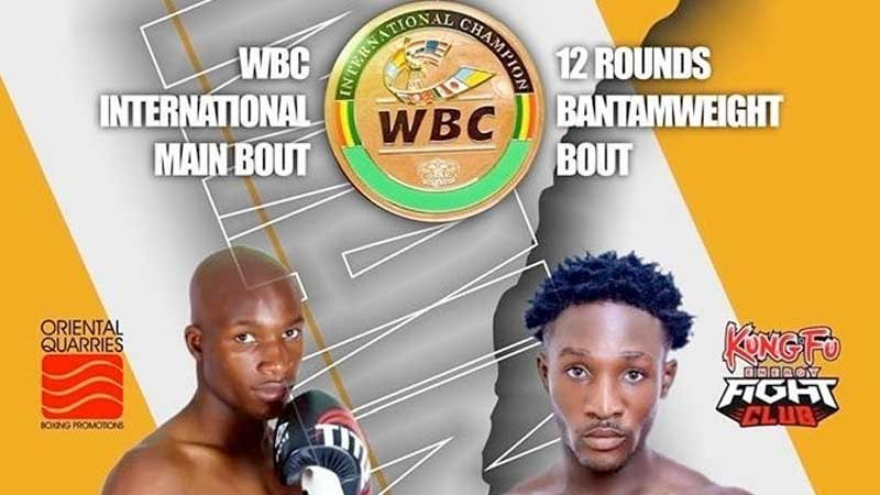 Promotional poster showing two male boxers facing forward. The WBC championship belt logo is at the top, with text: WBC International Main Bout, 12 Rounds Bantamweight Bout. Event sponsor logos appear at the bottom.